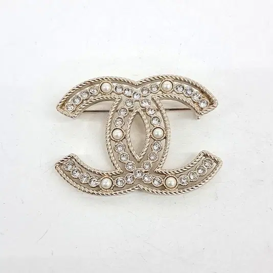 Chanel logo brooch