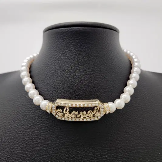 Chanel pearl logo necklace