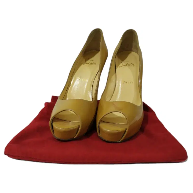 Christian Louboutins Nude Patent Peep Toe Pump