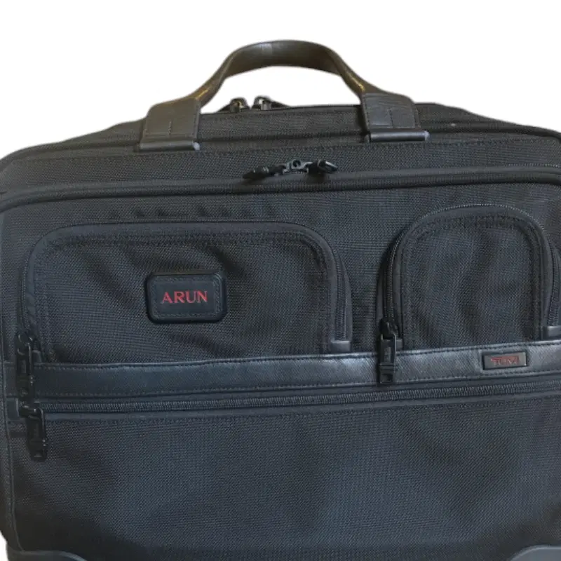 Tumi Alpha Ballistic Business 4 Wheel Deluxe Briefcase